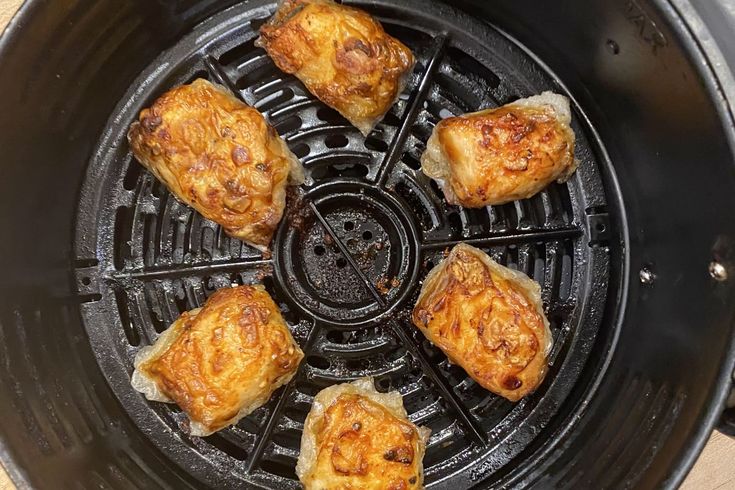 some food is cooking in an air fryer