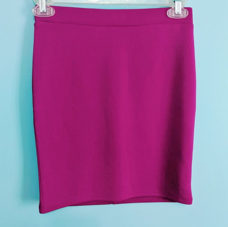 Stretchy Mini Skirt In A Really Nice Bright Magenta Color. Exposed Black And Silver Contrast Zipper In The Back. I'm Usually A Small At Forever 21 But I Found This To Run Smaller Than Usual Even With The Stretch. Measured Laying Flat: Waist: 12.5" Hips: 14" Length: 15.5" Purple Stretch Mini Skort, Chic Purple Short Skirt, Purple Mini Skort For Night Out, Casual Purple Skirt For Night Out, Purple Stretch Mini Length Bottoms, Purple Stretch Mini Skirt, Trendy Stretch Purple Mini Skirt, Stretch Purple Mini Length Bottoms, Purple Stretch Trendy Skirt