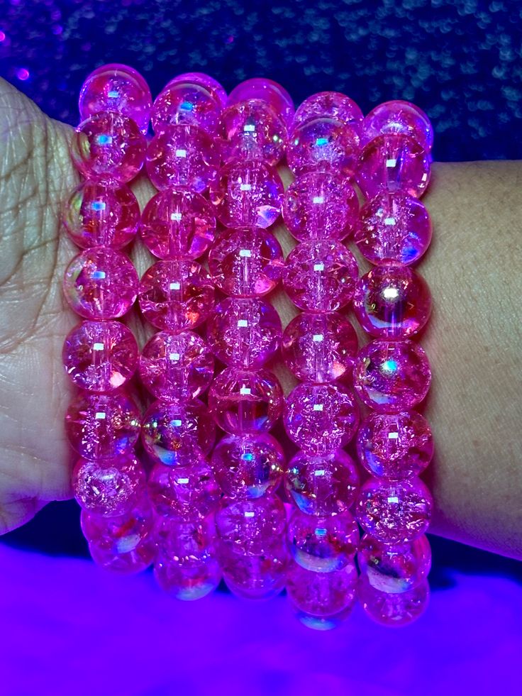 Royal Arm Candy Individual Bracelets feature 8mm or 10mm beads, making it the ideal accessory to adorn your arm and amplify its allure. What do you get: 1 bracelet Fits a 7" wrist but can stretch bigger 10mm beads Party Bracelets With Faceted Beads, Round Party Bracelets With Faceted Beads, Spiritual Pink Beaded Bracelets With Large Beads, Party Stretch Bracelet With Round Spacer Beads, Party Stretch Bracelet With Spacer And Round Beads, Round Beaded Bracelets With Spacer Beads For Party, Spiritual Party Bracelets With Faceted Beads, Healing Pink Bracelets With Spacer Beads, Pink Round Spiritual Beaded Bracelets