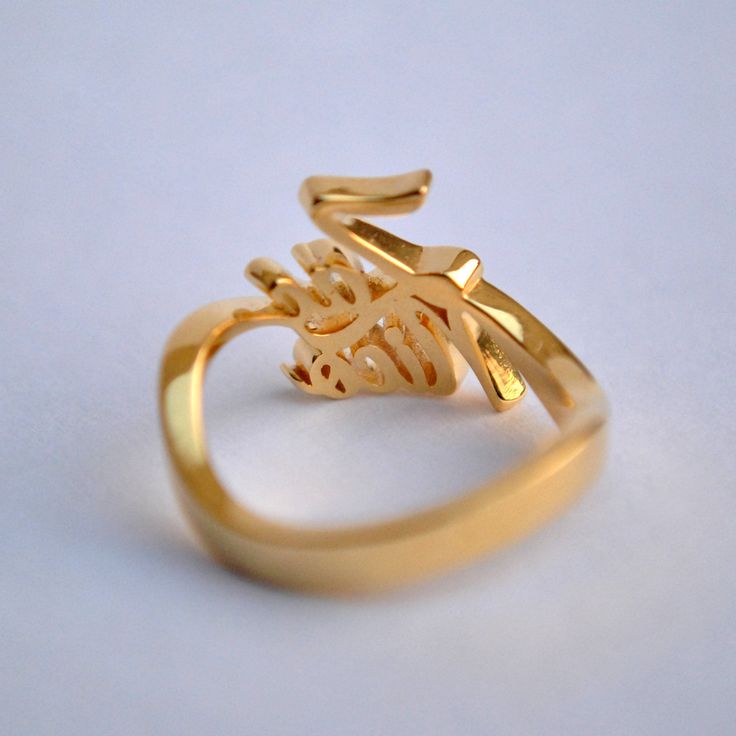 "Simply stunning! Beautiful handcrafted 14k Gold two name ring. This lovely custom made ring is perfect for that special and crazy relationship between the 'two-of-you'. Husband-wife, mother daughter, best friends, brothers, sisters and all of your loved ones - to own or to gift :) Important dates/coordinates can also be made. We will send a drawing before starting the manufacturing process so you know what it will look like. SENDING AS A GIFT We would be happy to send your gift directly to the Unique Gold Engraved Ring For Anniversary, Unique Gold Engraved Promise Ring, Handmade 14k Gold Engraved Wedding Ring, Yellow Gold Engraved Name Ring For Wedding, Unique Yellow Gold Engraved Ring For Gift, Customized Gold Open Ring, Unique Yellow Gold Engraved Ring As Gift, Customized Yellow Gold Rings For Gift, Customized Gold Engraved Elegant Ring