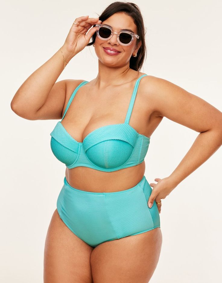 The Rachelle two-piece swimsuit in a medium blue is perfect for a day at the beach or lying poolside. This balconette bikini comes with a supportive underwire, fully adjustable straps, and matching high-waisted bottoms. (Available in plus-sizes 38DD-46DDD.) Underwire Swimwear With Built-in Bra For Pool, Underwire Swimwear With Padded Cups For Sunbathing, Summer Padded Underwire Swimwear, Underwire Swimwear With Removable Bra Pads, Padded Underwire Swimwear For Beach Season, Summer Swimwear With Padded Underwire Cups, Underwire Swimwear With Padded Cups For Swimming, Summer Underwire Swimwear With Padded Cups, Fitted Swimwear With Removable Cups For Summer