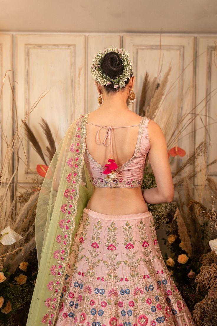 A pink, hand-embroidered zardozi lehenga with floral and geometric pattern is paired with a dainty checkered blouse and mint green dupatta.by Chamee and Palak.DELIVERY TIMEPlease allow 4-6 months for your outfit to arrive. FABRIC DETAILSRaw silk, Net Zardozi Lehenga, Green Dupatta, Checkered Blouse, 12 Weeks, Bridal Designs, Garment Bags, Cut Work, Geometric Patterns, Lehenga