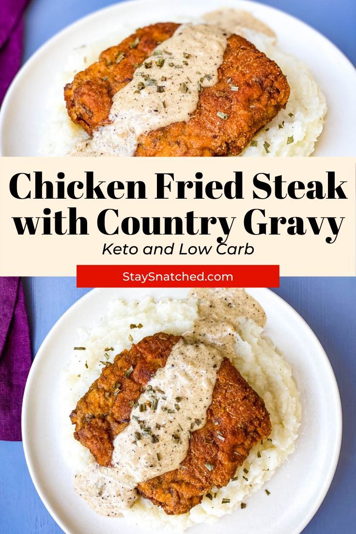 chicken fried steak with country gravy served over mashed potatoes on a white plate