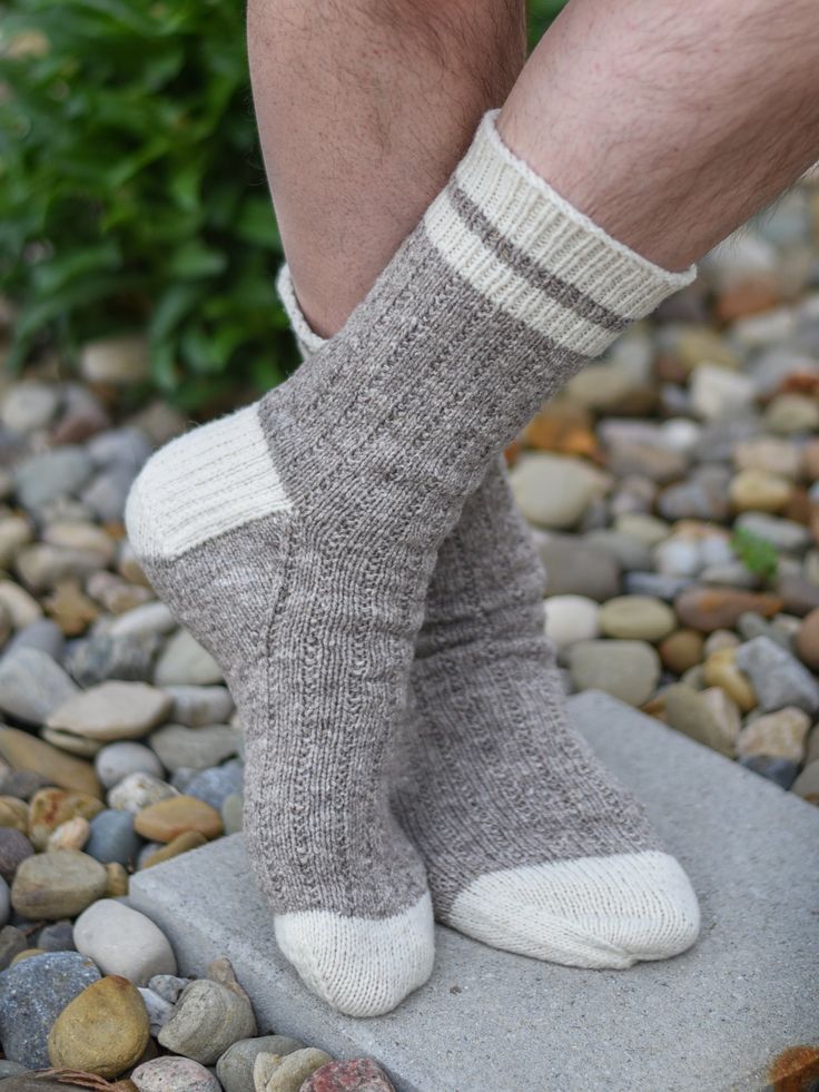 This top-down sock in five sizes (XS/S/M/L/XL) is one step away from a basic plain vanilla construction and universally appealing for men, women, and kids of all ages. Work in two colors to emphasize its vintage vibe or stick with one color for sleek simplicity. Whichever way you decide to work it, this project travels well and is an excellent choice for beginning sock knitters. This pattern calls for sport weight yarn, but may be worked in fingering yarn on smaller needles, using instructions f