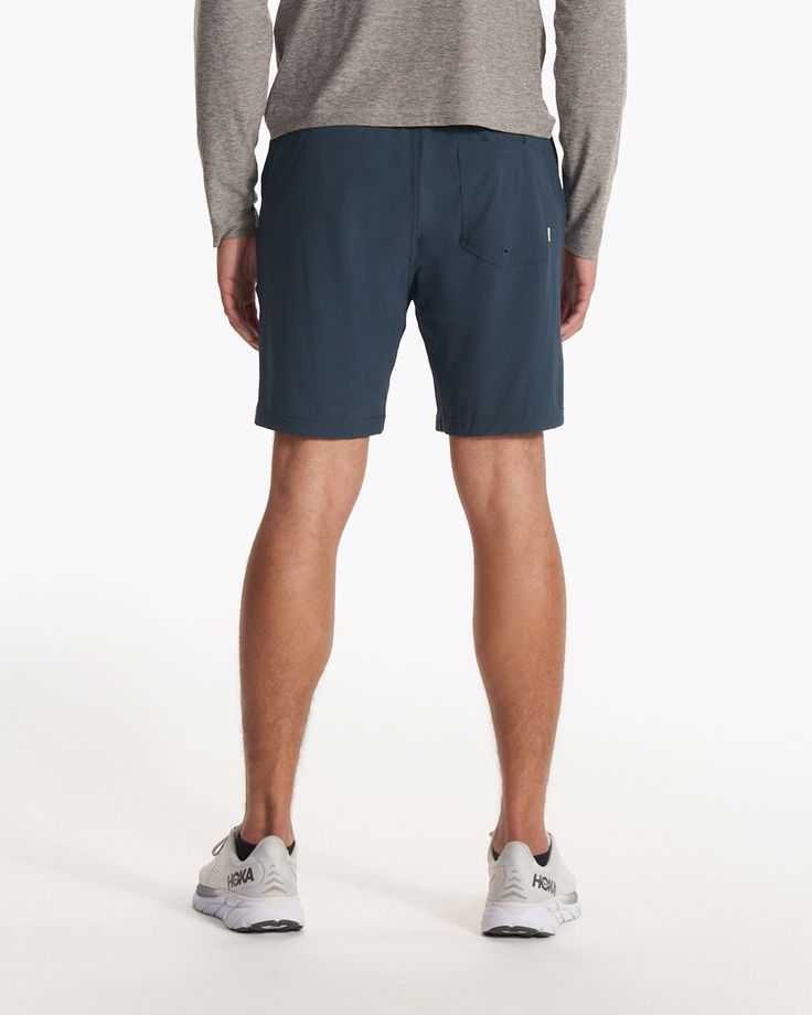 One short for every sport, the Kore Shorts have a classic athletic fit, falling just above the knee with an anywhere and everywhere versatility. Go commando in confidence with the breathable, boxer-brief liner. Also available in 5" and 9" inseam. | Vuori Kore Shorts | Indigo | XXL Vuori makes premium performance apparel inspired by the active Coastal California lifestyle; an integration of fitness, surf, sport, and art. Breaking down the boundaries of traditional activewear, we are a new perspec Casual Athletic Shorts With 5-inch Inseam For Sports, Sporty Swim Trunks With Built-in Shorts For Outdoor Activities, Bottoms With Built-in Shorts For Outdoor Activities, Swim Trunks With Built-in Shorts For Outdoor Activities, Outdoor Athletic Shorts With Built-in Shorts In Recycled Polyester, Recycled Polyester Short Activewear For Outdoor, Athleisure Athletic Shorts With Built-in Shorts For Outdoor, Recycled Polyester Athletic Shorts With Built-in Shorts For Outdoor, Outdoor Athletic Shorts With Built-in Liner From Recycled Polyester