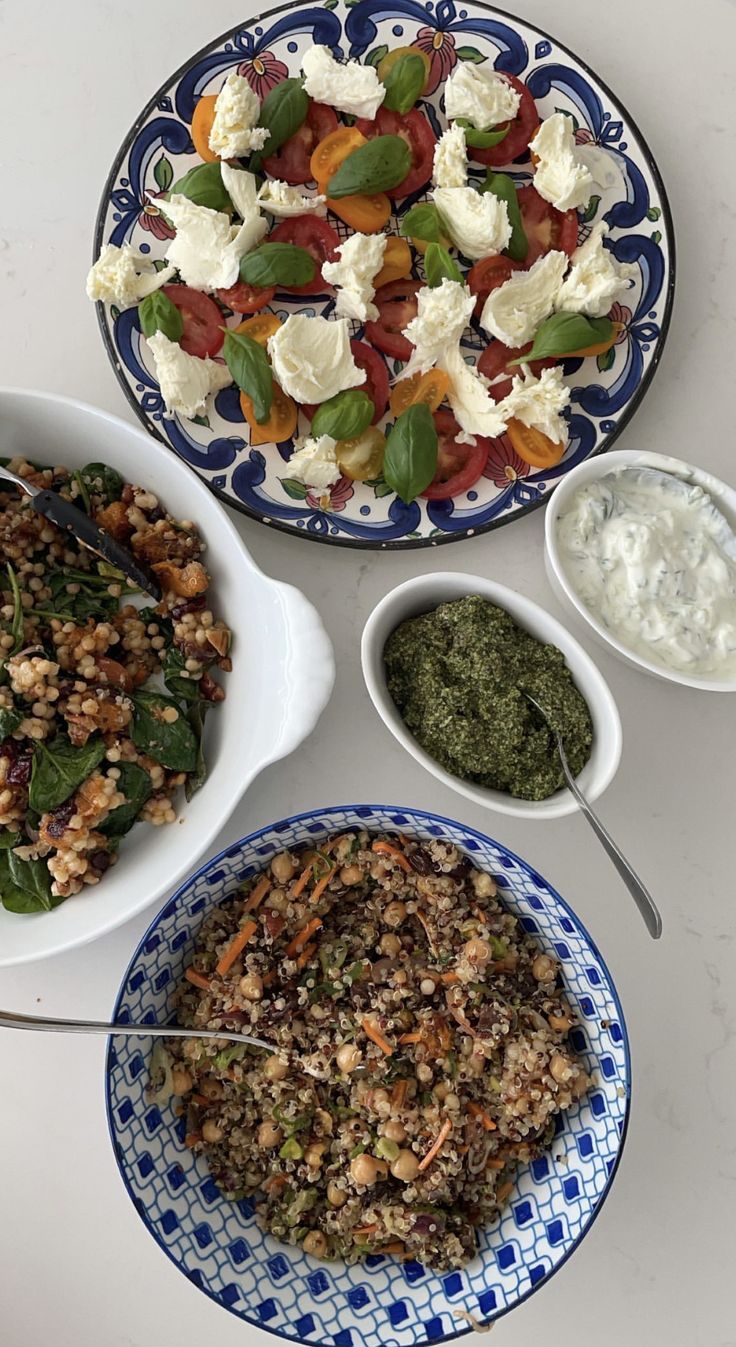 three plates filled with different types of food