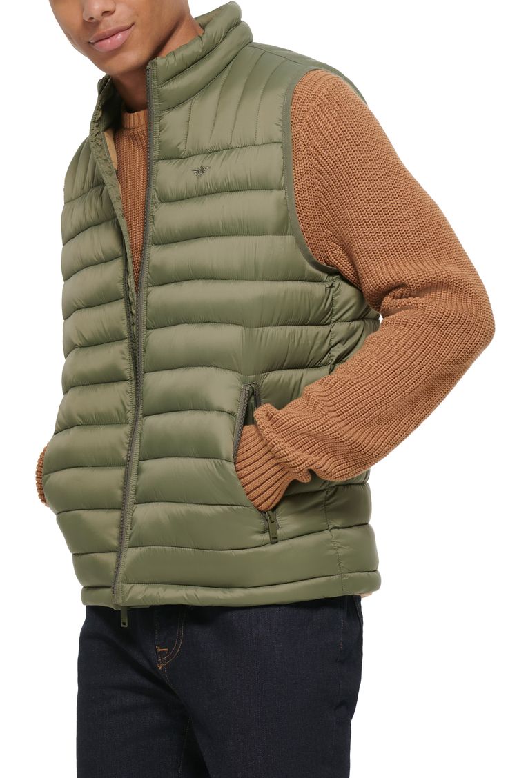 A quilted stand collar and lightweight fill insulate this heat-keeping puffer vest. 26 1/2" length (size Medium) Stand collar Front zip closure Front zip pockets Water resistant 100% nylon Machine wash, tumble dry Imported Winter Nylon Vest With Zipper Closure, Nylon Vest With Zipper Closure For Winter, Solid Color Quilted Puffer Jacket, Spring Outdoor Puffer Vest, Casual Nylon Puffer Jacket With Zipper, Casual Nylon Puffer Jacket With Zipper Closure, Spring Quilted Puffer Jacket For Outdoor Activities, Functional Nylon Puffer Jacket For Spring, Casual Nylon Puffer Jacket For Outdoor