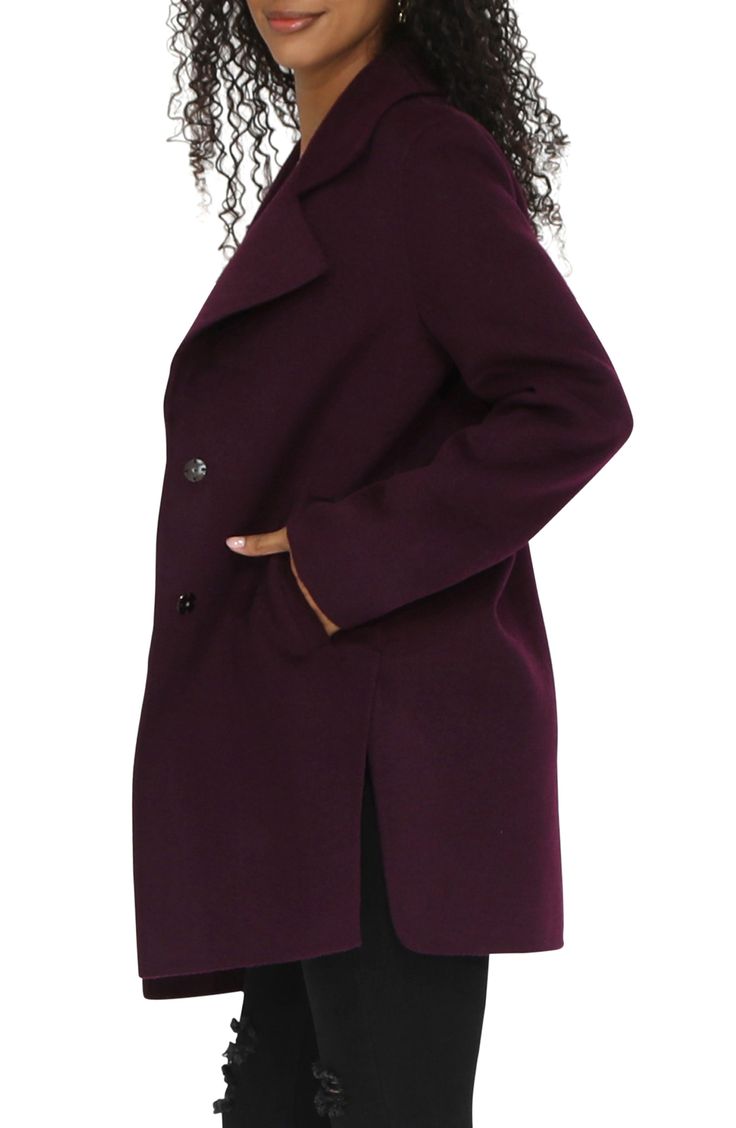 A cozy layering piece, this comfortably oversized coat is constructed from a warm wool blend and fashioned with notched lapels for polished style. 32" length Front snap closure Notched lapels Front welt pockets 50% wool, 50% polyester Dry clean Imported Oversized Wool Coat With Notch Lapel, Oversized Wool Pea Coat With Button Closure, Oversized Notch Lapel Wool Coat For Winter, Oversized Notch Lapel Pea Coat For Fall, Oversized Solid Wool Coat For Work, Oversized Wool Pea Coat With Lapel Collar, Oversized Solid Single Breasted Wool Coat, Solid Wool Coat For Cold Weather In Fall, Oversized Wool Blazer For Fall