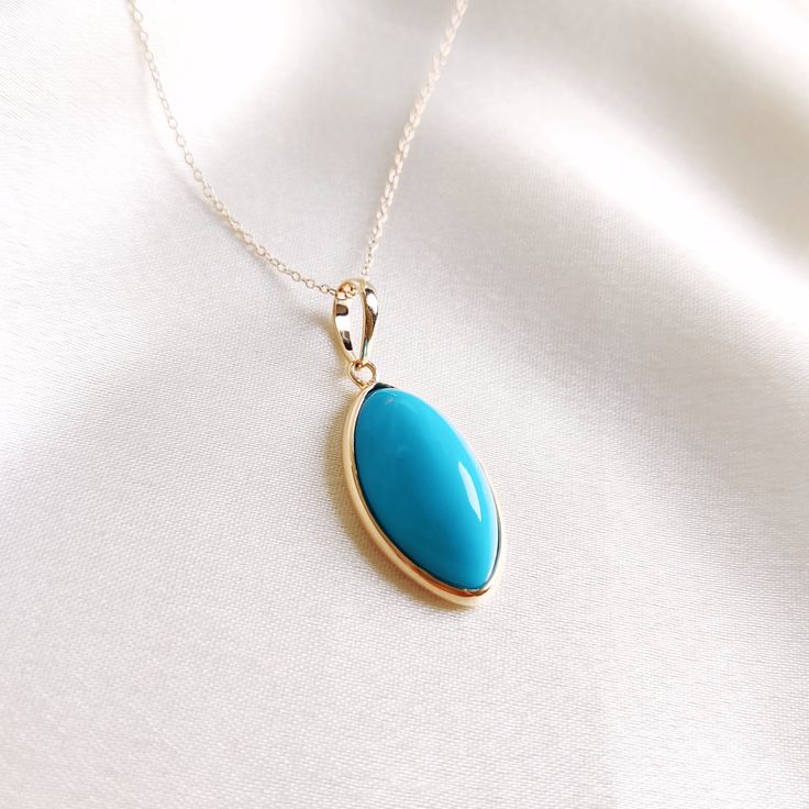 This stunning pendant is set in 14K Solid Yellow Gold with Natural Sleeping Beauty Arizona Turquoise with utmost precision. It is an unique gemstone pendant for nearly every occasion and is completely hassle-free jewelry. 🔷ABOUT GEMSTONE: Turquoise is a vibrant and highly valued gemstone that has been used for its beauty and perceived metaphysical properties. Turquoise is believed to provide protection against negative energies and harmful influences. It is thought to act as a shield, helping t Turquoise Gemstone Pendant Necklace, Fine Jewelry Turquoise Pendant Necklace, Fine Jewelry Turquoise Pendant Necklace Gift, Oval Turquoise Necklace In Yellow Gold As Gift, Blue Turquoise Gemstone Necklace, Elegant Oval Turquoise Necklace, Oval Yellow Gold Turquoise Necklace As Gift, Turquoise Pendant Gemstone, Elegant Turquoise Necklace With Oval Pendant