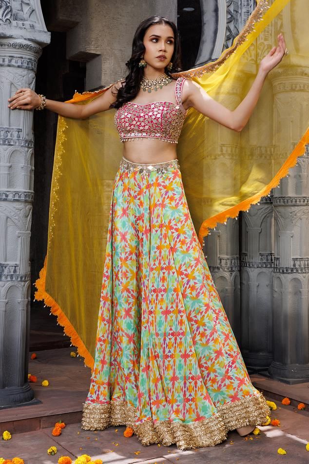 Pink, yellow, multicolor lehenga with geometric print all over and embroidered border. Paired with mirror, pearl, beads, dori embroidered padded blouse and dupatta.
Components: 3
Pattern: Printed, Embroidery
Type Of Work: Geometric, mirror, pearl, bead, dori
Neckline: Sweetheart neck
Sleeve Type: Sleeveless
Fabric: Crepe
Color: Multi Color
Other Details: 
Lehenga:
Geometric pattern
Embroidered border
Approx. product weight: Less than 2 kgs
Blouse:
Padded
Pearl drops on hem
Dupatta:
Cutwork embro Multicolor Lehenga, Geometric Mirror, Printed Embroidery, Padded Blouse, Embroidered Border, Sweetheart Neck, Cut Work, Set For Women, Aza Fashion