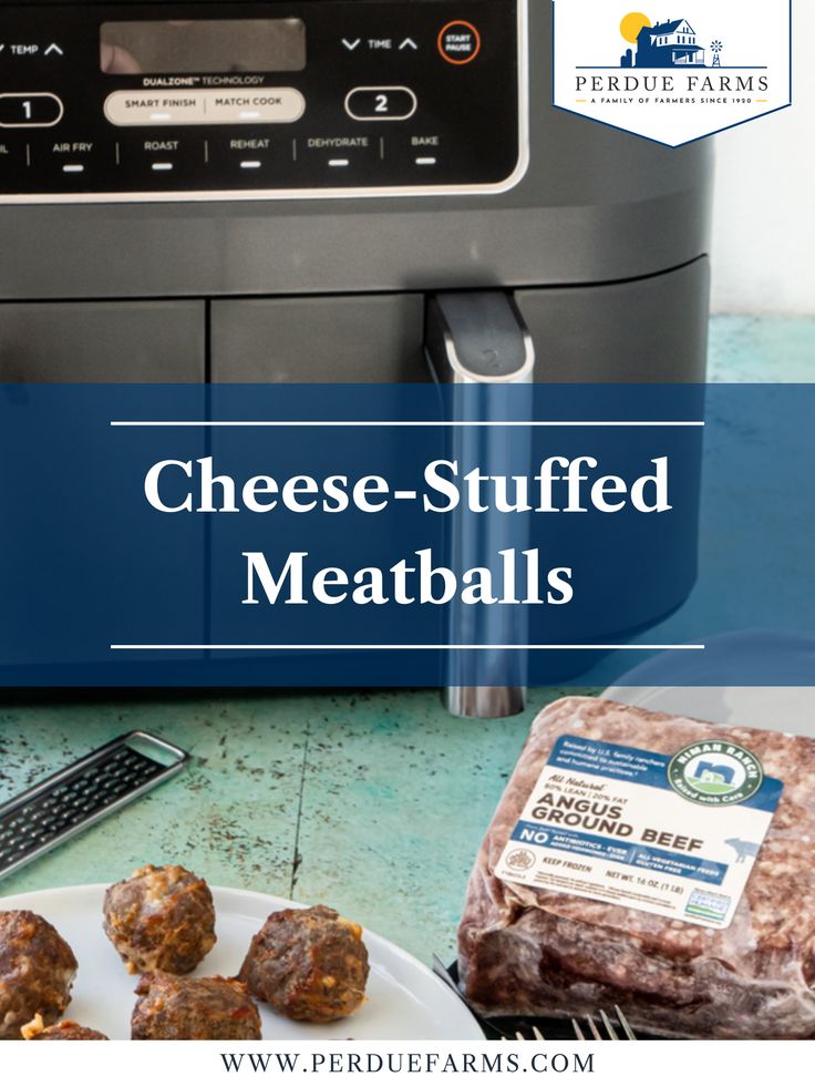 some meatballs are sitting on a plate next to an air fryer with the words cheese - stuffed meatballs