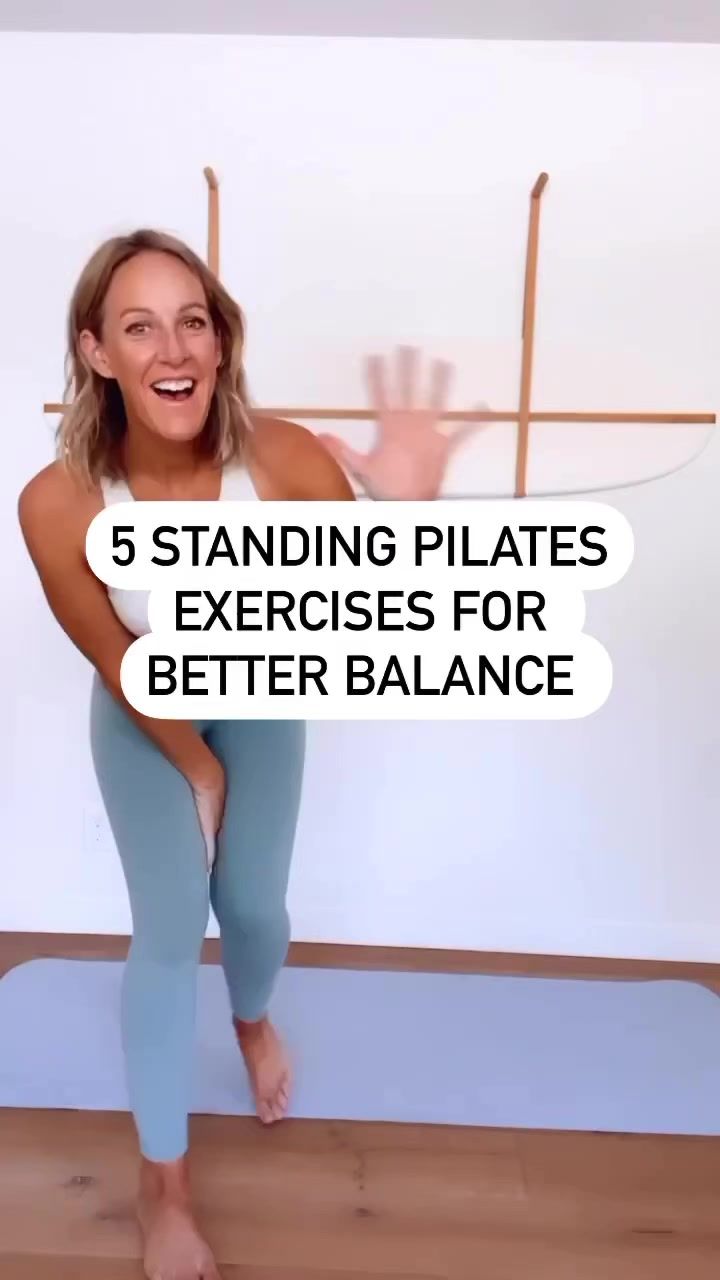 a woman is standing on one leg and smiling with the words 5 standing pilates exercises for better balance