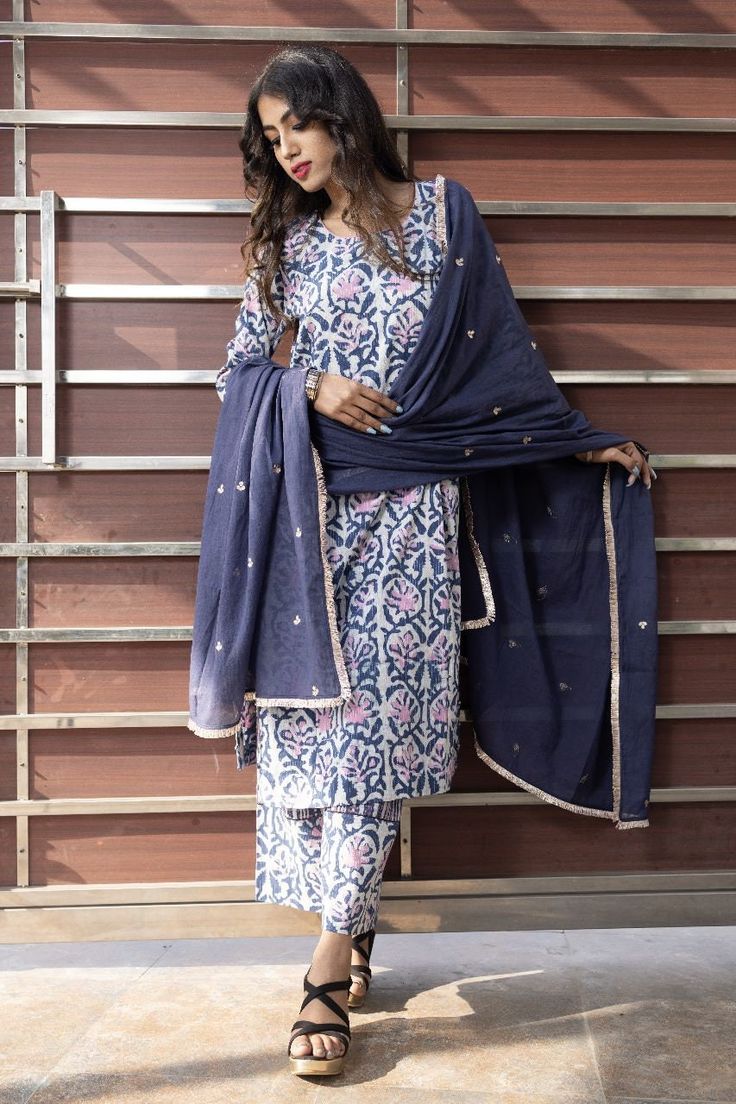 This indigo and pink suit set is a perfect summer vibe comfort wear. The mul-mul dupatta is embroidered with gota work. Semi-stitched Cotton Blue Palazzo Set, Blue Semi-stitched Cotton Palazzo Set, Blue Cotton Salwar Kameez With Gota Work, Blue Cotton Kurta With Gota Work, Blue Cotton Anarkali Set With Gota Work, Blue Mulmul Lawn Suit With Zari Work, Blue Mulmul Palazzo Set With Dupatta, Blue Cotton Palazzo Set For Navratri, Festival Cotton Indigo Dupatta