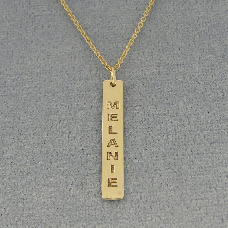 "*Bar Measurement: 1 inch (26 mm) X 3/16 inch (4.8 mm) Approx. *Pendant Thickness: 0.7 mm / 22 Gauges / 0.028\" *Up to 9 Letters, numbers or symbols. *Chain : Optional (1.0 mm Rollo chain 16, 18 or 20 inch). *Premium high end quality fine solid 10kt or 14kt solid yellow or white gold vertical bar necklace with high polished finish and deeply laser engraved your name or word and cut out by latest technology laser machine, top quality guaranteed." Personalized Yellow Gold Jewelry With Rectangular Shape, Personalized Gift Rectangular 14k Gold Jewelry, Personalized Yellow Gold Rectangular Jewelry, 14k Gold Rectangular Pendant Jewelry For Personalized Gift, 14k Gold Engraved Nameplate Jewelry, Stamped 14k Gold Rose Gold Jewelry, Engraved 14k Gold Rectangular Jewelry, Rectangular Engraved 14k Gold Jewelry, Engraved Rectangular 14k Gold Jewelry