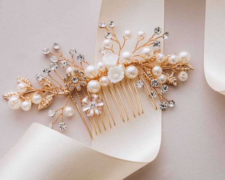 Elevate your bridal hairstyle with our exquisite Bridal Hair Comb, a timeless accessory designed to add elegance to your special day. This beautifully crafted hair comb features intricate details, delicate pearls, and shimmering crystals. The Bridal Hair Comb effortlessly slides into your hair, transforming your look into one of sophistication and grace. Choose Hundred Hearts Accessories for a touch of timeless beauty on your wedding day. Feature This hair vine comb is very soft, lighter, and ea Beautiful Bridal Hair, Heart Accessories, Bridal Hairstyle, Simple Logo, Bridal Hair Comb, Hair Vine, Timeless Accessories, Wedding Hair Accessories, On Your Wedding Day