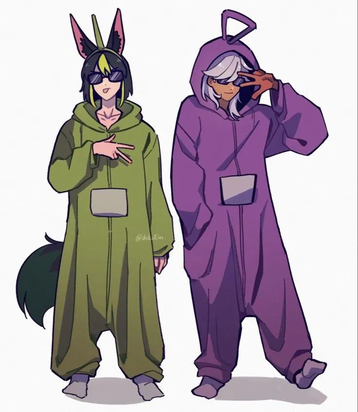 two people in animal onesuits standing next to each other with their hands on their ears