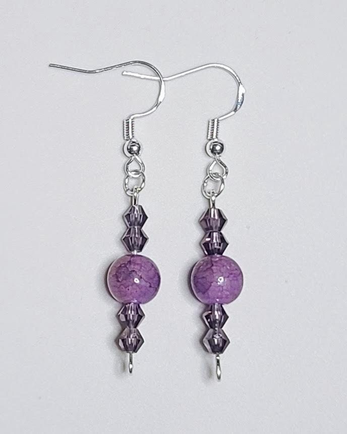 Beaded earrings Purple Drop Earrings With Dangling Beads, Beaded Drop Crystal Earrings, Czech Glass Beaded Earrings With Dangling Beads, Czech Glass Dangle Beaded Earrings With Faceted Beads, Purple Dangle Earrings With Beads, Adjustable Crystal Earrings With Faceted Beads, Adjustable Beaded Czech Glass Crystal Earrings, Adjustable Beaded Clip-on Earrings With Round Beads, Adjustable Beaded Crystal Drop Earrings