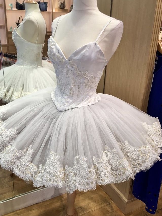 a white dress on display in a store