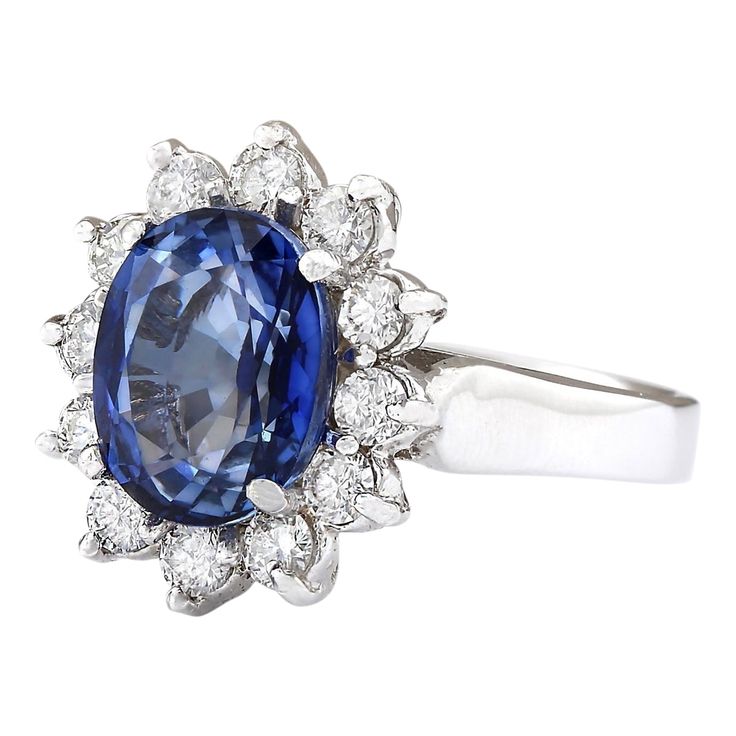 Stamped: 14K White Gold Total Ring Weight: 5.3 Grams Ring Length: N/ARing Width: N/A Gemstone Weight: Total Natural Sapphire Weight is 4.29 Carat (Measures: 10.10x8.15 mm) Color: Blue Diamond Weight: Total Natural Diamond Weight is 0.85 Carat quantity: 12 Color: F-G, Clarity: VS2-SI1 Face Measures: 15.90x14.30 mm Sku: [703950W] Luxury Sapphire Cluster Ring With Brilliant Cut, Classic Platinum Gemstones With Halo Setting, Luxury Cluster Sapphire Ring Gia Certified, Luxury Gia Certified Cluster Sapphire Ring, Oval Gemstones With Halo Setting For Formal Occasions, Gia Certified Classic Gemstones For Formal Occasions, Oval Diamond Gemstones For Formal Occasions, Formal Oval Diamond Gemstones, Oval Center Stone Gemstones For Formal Occasions