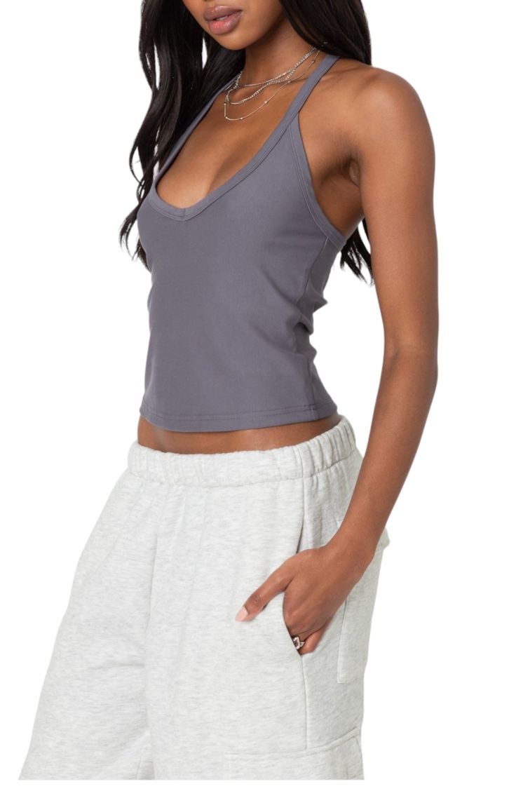 Full-range movement is a breeze in this racerback tank made with generous stretch. Scoop neck Racerback 45% rayon, 45% nylon, 10% spandex Machine wash, line dry Imported Gray Athleisure Tank Top With Built-in Bra, Casual Gray Tank Top With Built-in Bra, Sporty Seamless T-back Tank Top, Fitted Go-dry Racerback Top, Sporty Seamless T-back Top, Summer Athleisure Seamless Tank Top, Summer Seamless Athleisure Tank Top, Fitted Go-dry Scoop Neck Tank Top, Stretch Moisture-wicking Racerback Tank Top