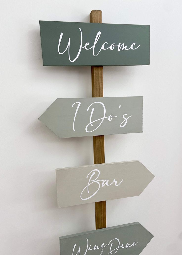 three wooden signs that say welcome, do's and don'ts