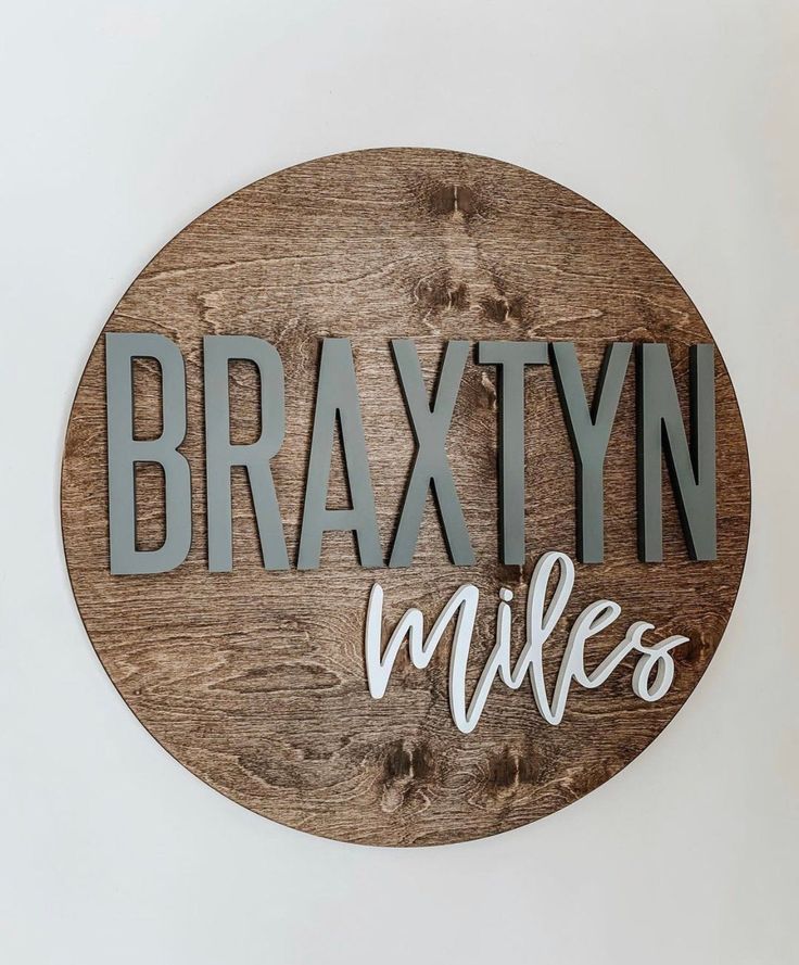 a wooden sign with the words braxtyn hills on it's side,