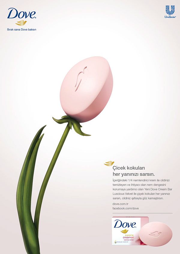 an advertisement for dove with a pink flower