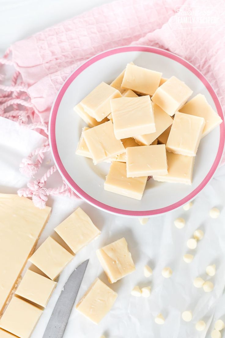 some pieces of cheese are on a plate