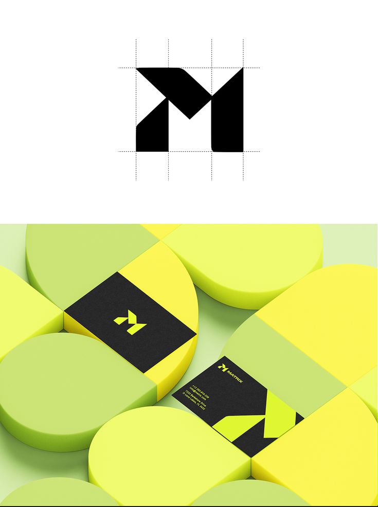 the letter m is made up of yellow and black circles with an arrow on each side