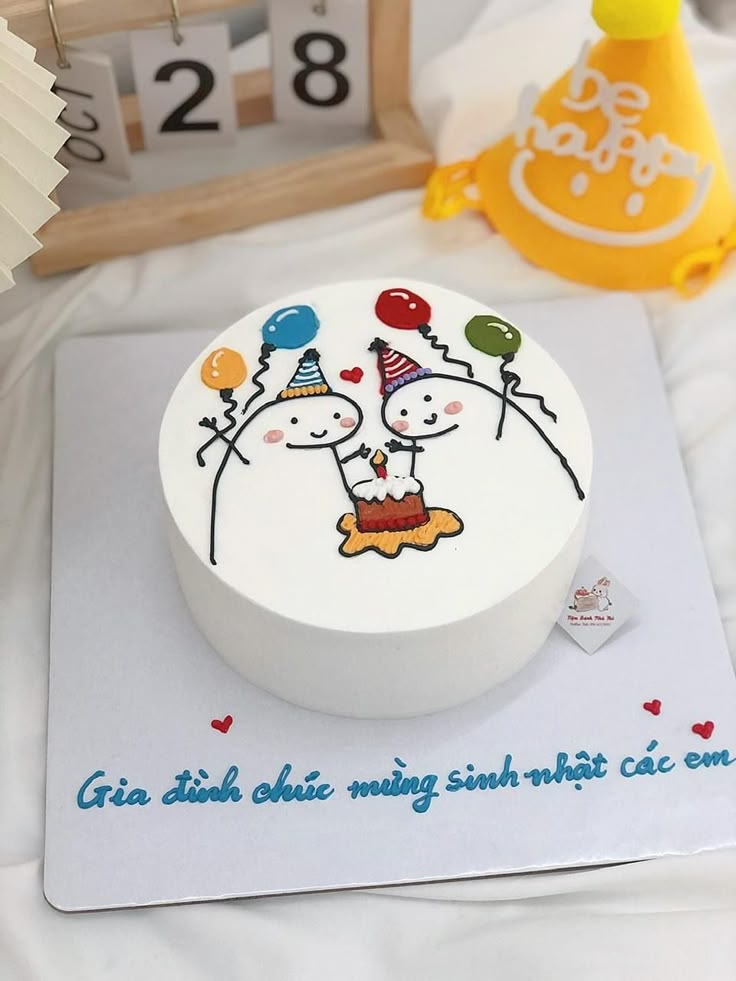 a birthday cake with two cartoon characters on it