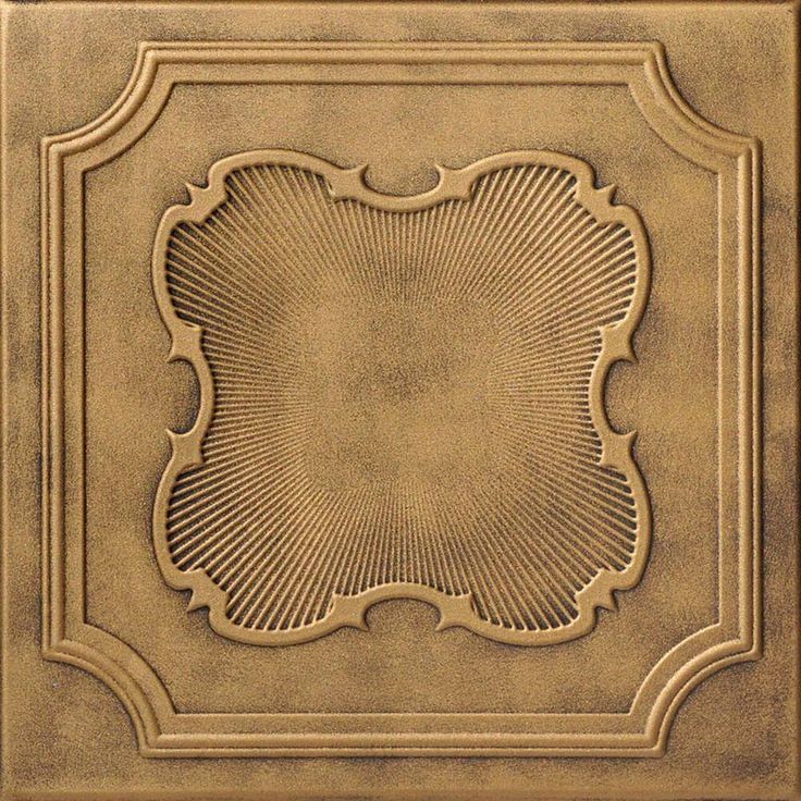 an intricately designed ceiling tile is shown in this image, it looks to be painted gold