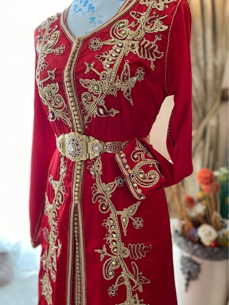 2 piece red kaftan Traditional Moroccan clothing is referred to as kaftan All couture pieces are made from the finest fabrics and are decorated with beads. Traditional Red Long Sleeve Kaftan, Red Long-sleeved Kaftan For Party, Red Long Sleeve Kaftan For Party, Bohemian Long Red Sets, Elegant Hand Embellished Kaftan For Festivals, Elegant Red Abaya With Dabka Detailing, Long Red Kaftan For Eid, Red Bohemian Ceremonial Kaftan, Red Bohemian Kaftan For Ceremonial Occasions