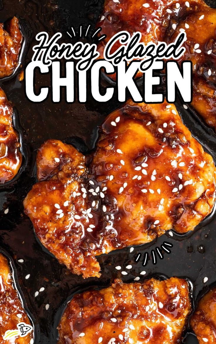 honey glazed chicken in a black skillet with sesame seeds on top and the words honey glazed chicken above it