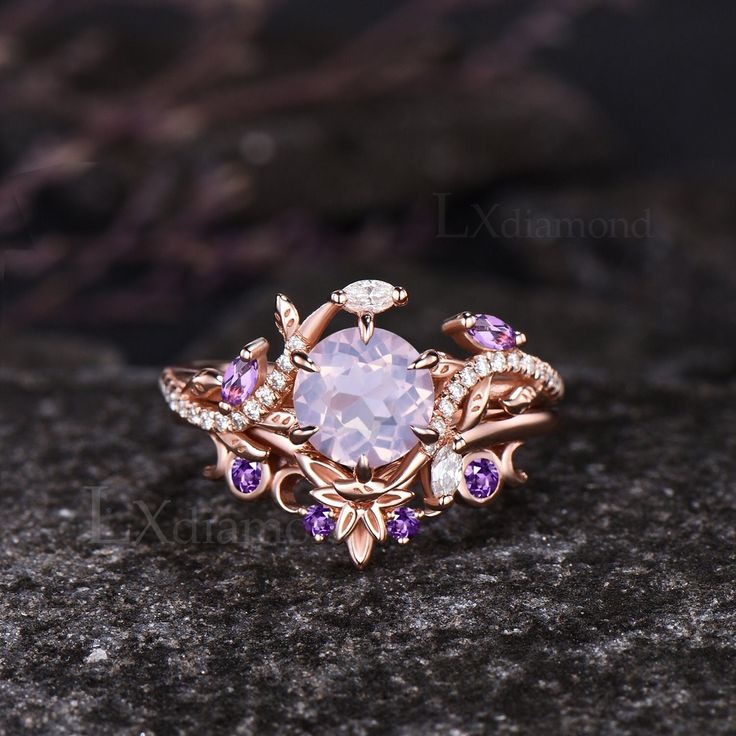 Item description ✦ Handmade, high-quality item! ✦ Material: 925 sterling silver, Solid 10k/14K/18K GOLD (can be made in white/rose/yellow gold) Engagement ring ✦ Center stone: Natural Lavender Amethyst. ✦ Size/Weight: 7mm Round Cut ✦ Side stones: Marquise Cut Natural Amethyst and Marquise Cut/Round Cut Moissanites Wedding band ✦ Gemstones: Round Cut Natural Amethyst Any ring size can be made,if the ring size is not in the option list ,contact me. As it is handmade,it needs 2-4 weeks to finish and then be shipped by usps or DHL. Return policy: We offer 30 days return policy. For any reason, if you are not completely satisfied with your order, you may return it for a refund.  Buyer is responsible for the handcraft fee (15%-30% of the total price) and the return shipping cost. Amethyst Gemstone Jewelry, Rose Gold Gemstone Ring, Rings Engagement Purple, Amethyst Ring Designs, Amethyst Engagement Ring Gold, Amethyst Engagement Rings, Purple Wedding Rings, Fantasy Rings, Amethyst Wedding Ring