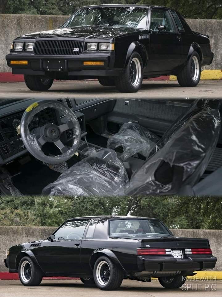 an old car is covered in plastic and parked on the street