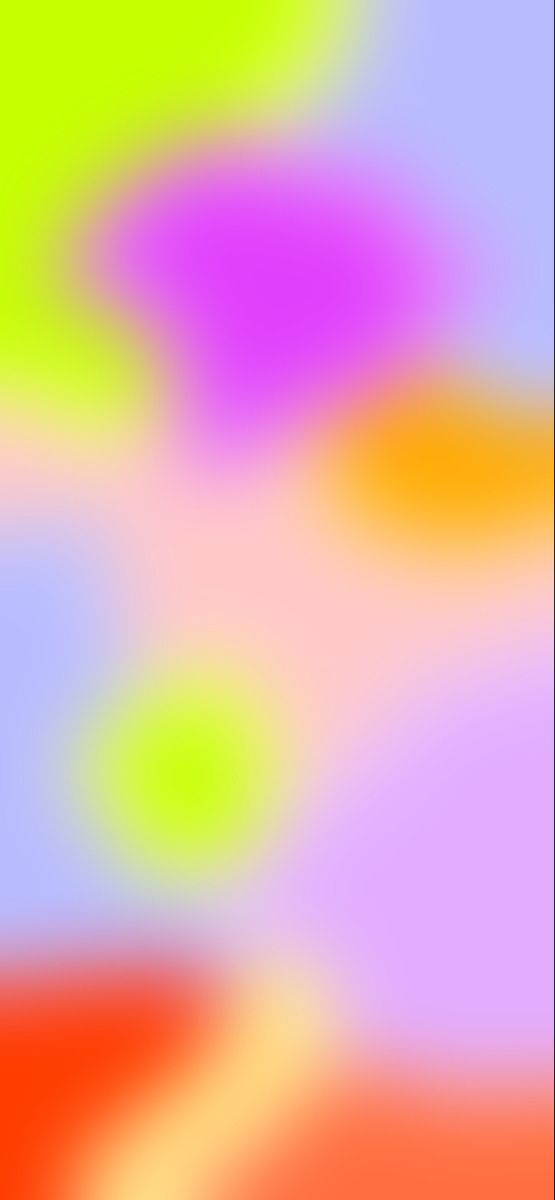 a blurry image of an orange, green and blue background