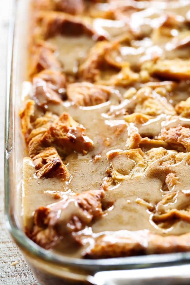 a casserole dish with meat and gravy in it on a table