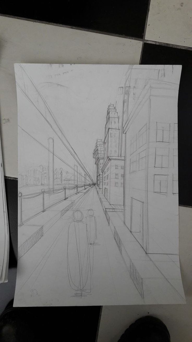 a pencil drawing of a city street with buildings