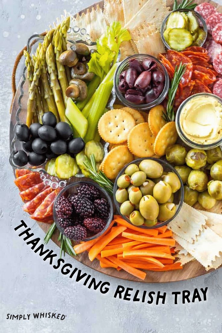 a platter filled with different types of food and the words thanksgiving relish tray