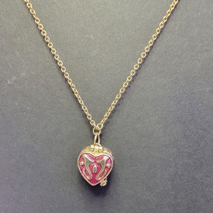 Nwot Absolutely Gorgeous Very Rare Unique Vintage Gold/Dk Pink Prayer Locket Necklace 14" Chain See All 6 Pics All My Listing Are Cross Posted Check Out My Listing Hello Kitty Items, & So Much Much More Listed All The Time Ty Pink Round Pendant Jewelry With Heart Charm, Pink Heart Charm Round Pendant Jewelry, Pink Round Pendant With Heart Charm, Pink Pendant Necklace With Adjustable Chain, Pink Round Necklace For Valentine's Day, Pink Metal Charm Necklace With Chain, Pink Round Charm Necklace With Adjustable Chain, Pink Heart Pendant Charm Necklace On Clavicle-length Chain, Pink Heart-shaped Charm Necklaces With Lobster Clasp