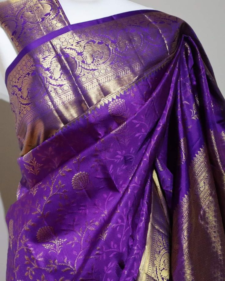 Part of our premium silks collection. Pure Kanchipuram Handloom Saree. Royal, purple saree with golden zari and matching blouse material (see last pic) Silk Mark Certified. Unstitched Purple Blouse Piece For Eid, Purple Wedding Saree With Unstitched Blouse, Traditional Purple Formal Sets, Gold Katan Silk Saree For Formal Occasions, Purple Tissue Silk Saree Set, Purple Tissue Silk Blouse Piece For Diwali, Purple Silk Lehenga With Unstitched Blouse, Elegant Purple Saree For Festivals, Elegant Purple Blouse Piece With Cutdana