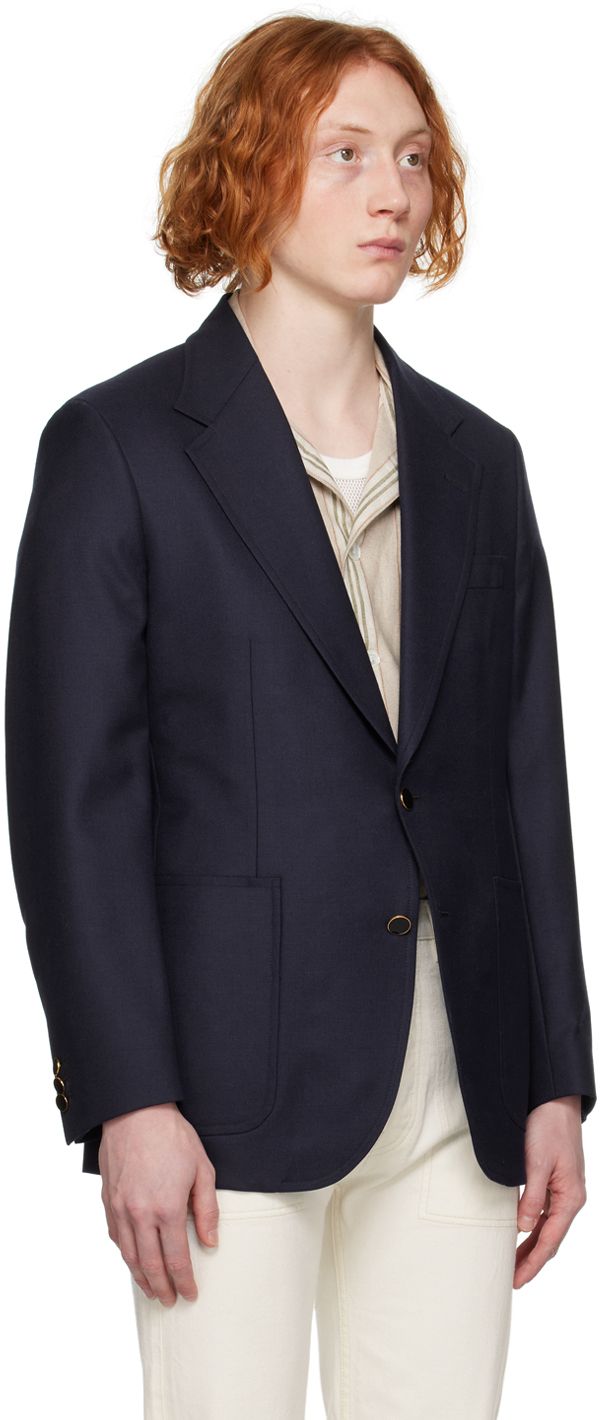 Plain-woven wool blazer. · Notched lapel · Two-button closure · Patch pockets · Padded shoulders · Three-button surgeon's cuffs · Central vent at back hem · Welt pockets at interior · Full twill and satin lining · Enameled black hardware Supplier color: Navy Formal Wool Blazer With Pockets, Business Sport Coat With Button Cuffs And Suit Collar, Business Sport Coat With Button Cuffs, Classic Sport Coat With Button Cuffs And Notch Lapel, Timeless Blazer With Notch Lapel And Button Cuffs, Timeless Notch Lapel Blazer With Button Cuffs, Classic Wool Suit With Button Cuffs, Classic Wool Suits With Button Cuffs, Formal Wool Blazer With Button Closure