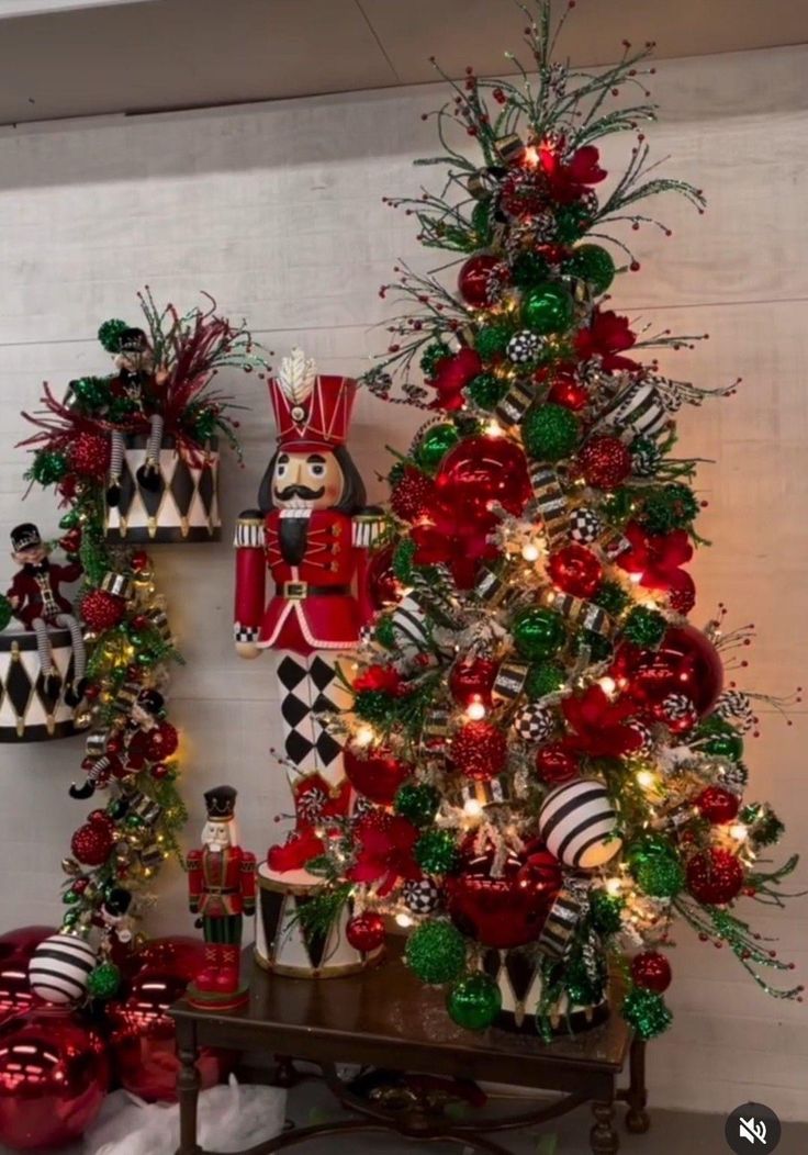 a christmas tree decorated with red and green ornaments