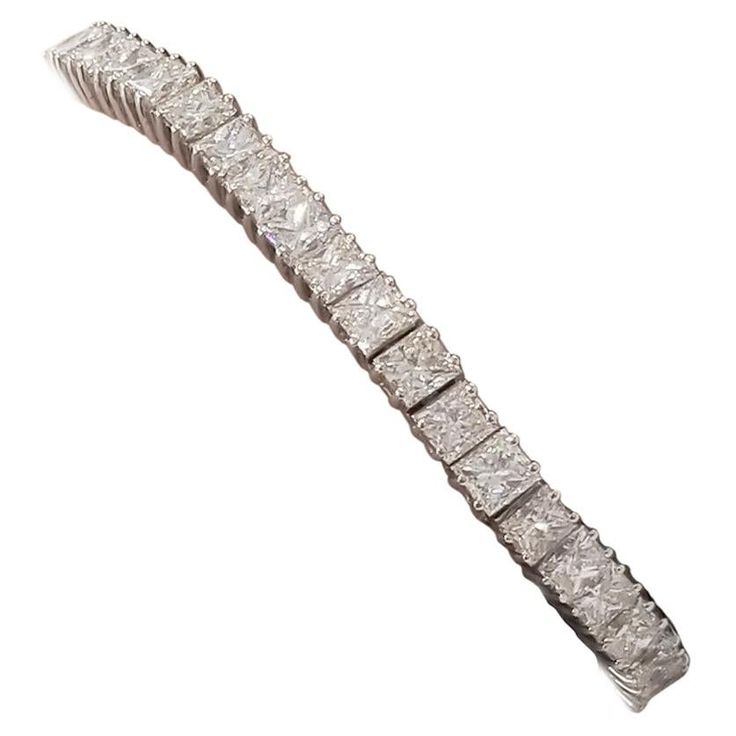 A bracelet fit for a princess, or your queen! Luxuriously fashioned of high-quality 18 Karat white gold, this spectacular Tennis bracelet is elegant enough to be worn at any Hollywood red-carpet event. This bracelet features an astounding 20.66 carat total sparkling VS quality princess cut diamonds set in 4 prongs into a linear row. The tennis bracelet is big, versatile, elegant and is sure to turn heads and start interesting conversations. What a way to set yourself apart with a bracelet full o Bracelet White Gold, Hollywood Red Carpet, Princess Cut Gold, Flawless Diamond, Bracelet Tennis, Expensive Jewelry Luxury, Antique Bracelets, Diamond Bangles Bracelet, Diamond Tennis Bracelet