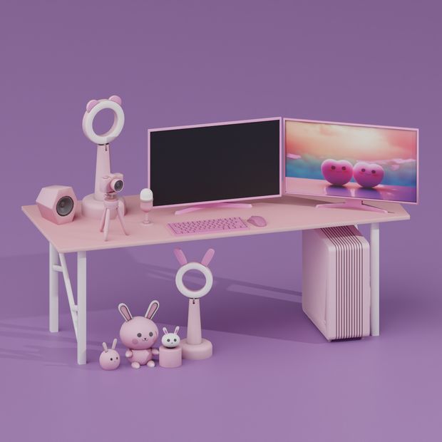 a computer desk with two monitors on top of it next to a toy bunny rabbit