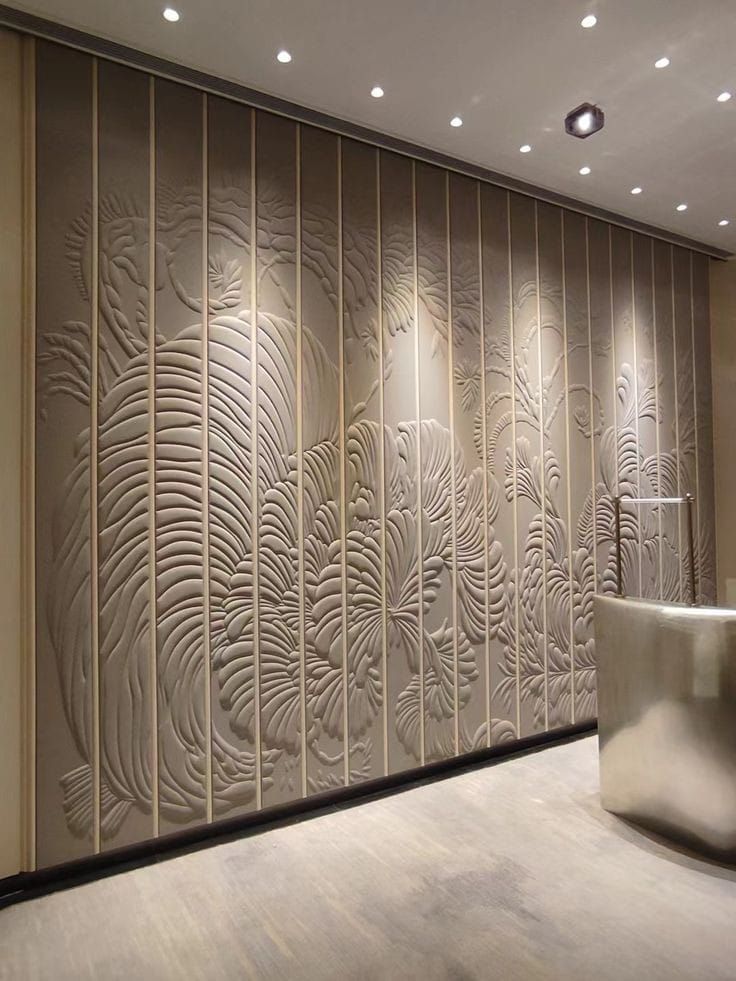 an artisticly designed wall in a modern office building, with decorative panels on the walls