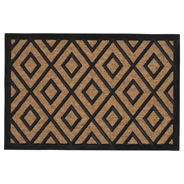 a black and tan door mat with diamond design on the bottom, in front of a white background