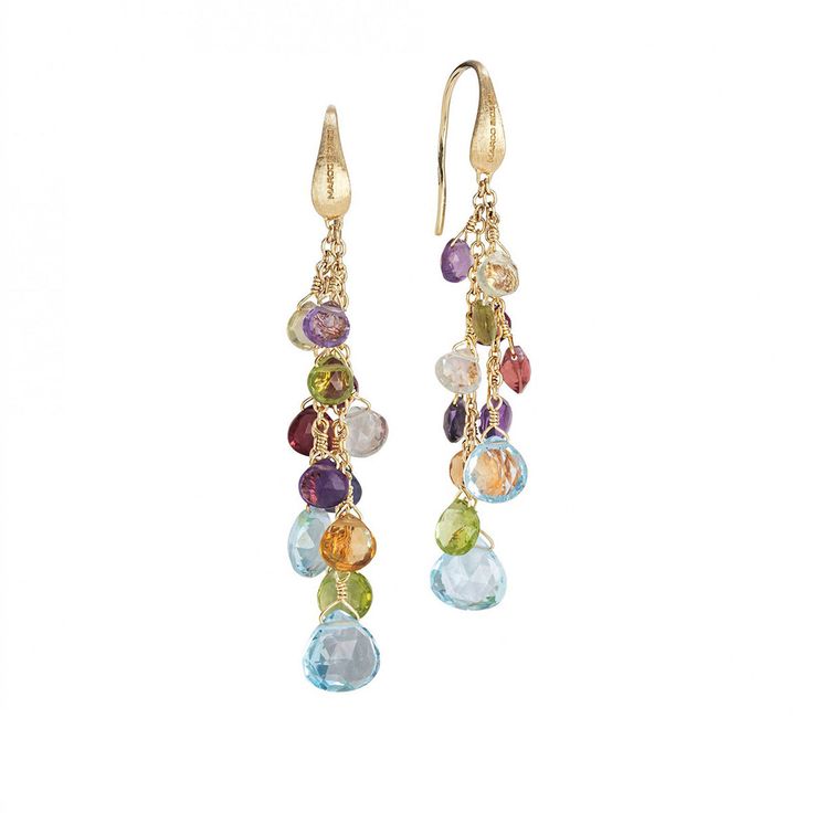 The featured materials for these earrings include 18K yellow gold, topaz as the primary gemstone, and a mix of secondary gemstones. The primary color is a vivid blue, and the design is part of the Paradise collection. Marco Bicego Jewelry, Silver Sisters, Golden Beads, Trending Bracelets, Round Diamond Setting, Marco Bicego, Contemporary Earrings, Open Hoop Earrings, The Paradise