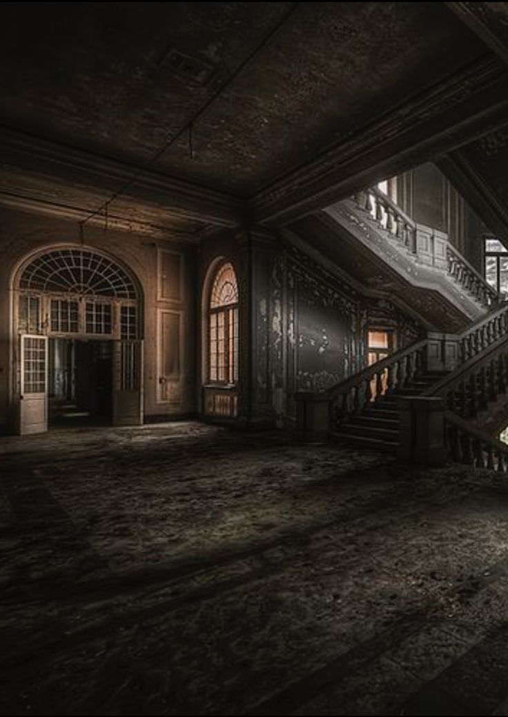 an old building with stairs and windows