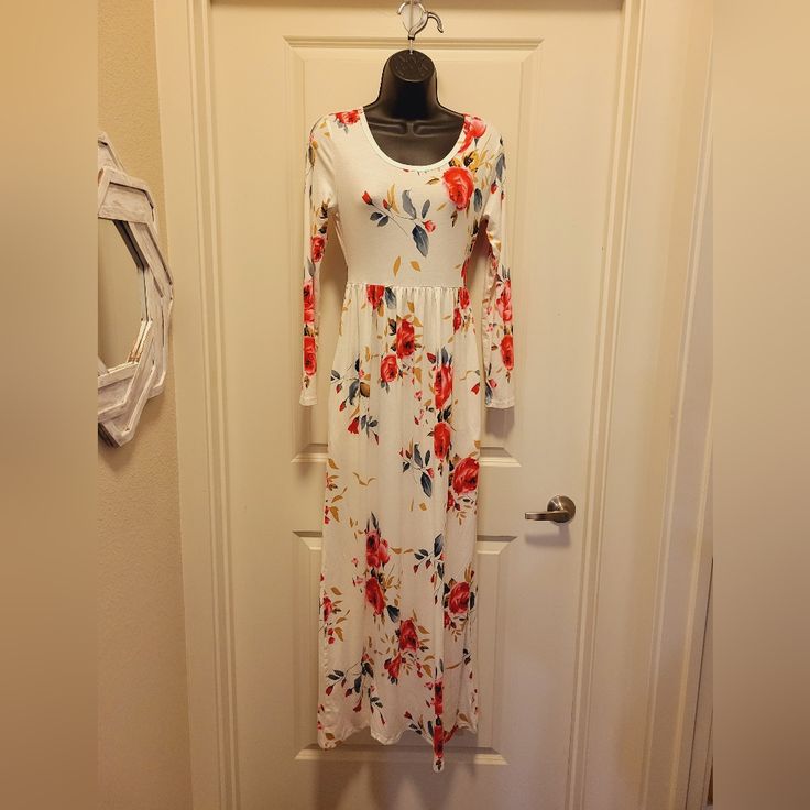 Nwt, Boutique, Size Small Up To A Medium, Soft And Stretchy, Longer Sleeves, Pockets. 95% Rayon 5% Spandex Pit To Pit 20" Length 55" Price Is Listed As Firm. Thanks For Understanding. White Stretch Long-sleeve Maxi Dress, White Long Sleeve Stretch Maxi Dress, White Floral Print Stretch Maxi Dress, White Stretch Maxi Dress With Floral Print, White Stretch Maxi Dress For Brunch, Spring White Stretch Maxi Dress, Spring Stretch White Maxi Dress, White Stretch Maxi Dress For Spring, Casual Stretch Maxi Dress For Brunch